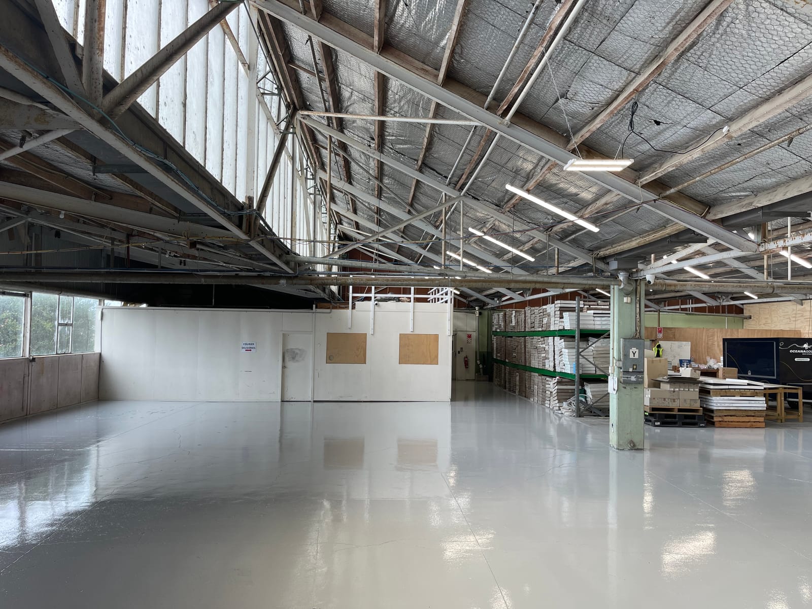 Epoxy coating applied across a warehouse floor